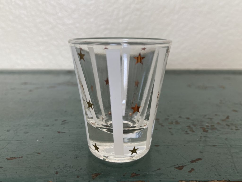 Gay Fad Anchor Hocking shot glass with stars and stripes.